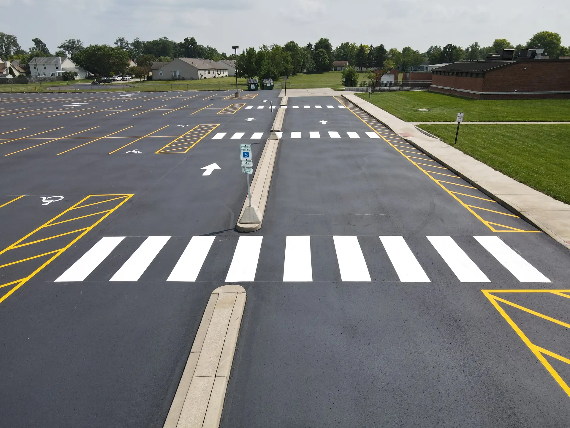 Empty parking lot with crosswalks.